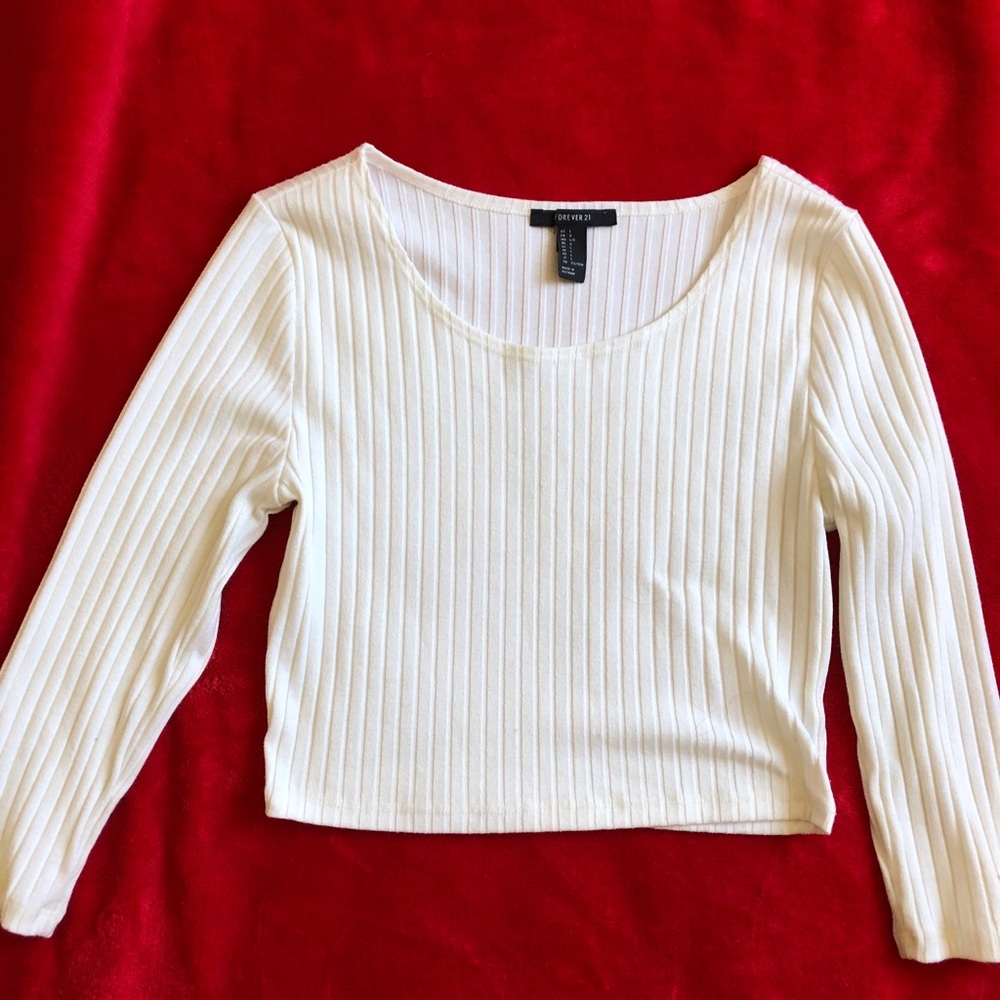 white textured crop top with mid length sleeves